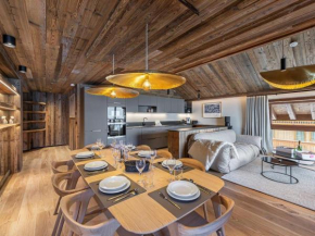 Appartement neuf, sauna, cheminée, accès pistes, parking couvert, balcon ensoleillé. - FR-1-565-92